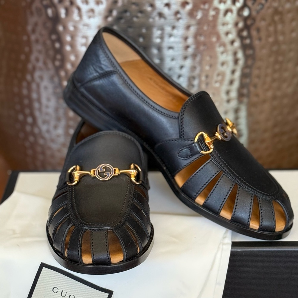 Gucci Black Leather Loafers with Gold Accents